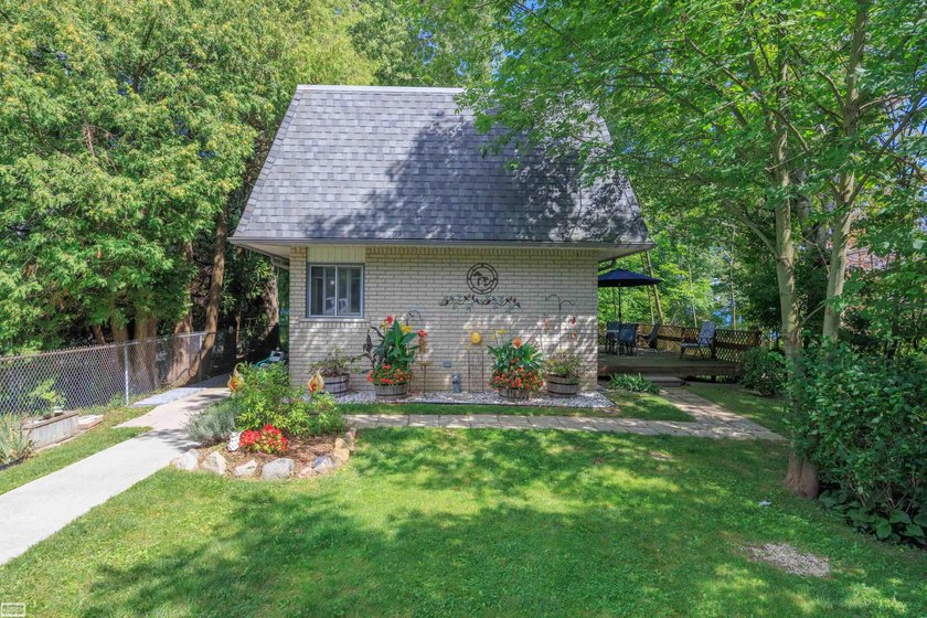 Enjoy your own Lakehouse retreat perched on the peaceful - Beach Home for sale in Applegate, Michigan on Beachhouse.com