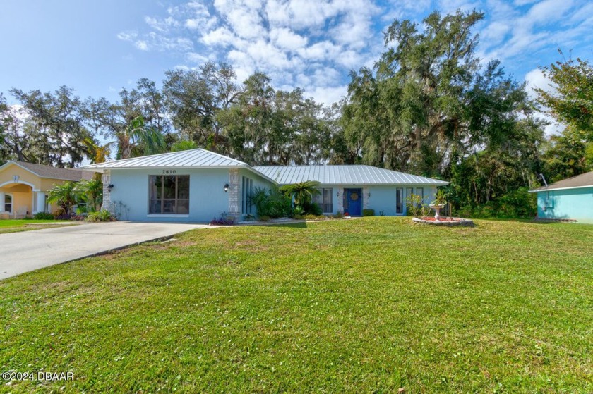 This meticulously maintained 4-bedroom, 3-bath concrete block - Beach Home for sale in Edgewater, Florida on Beachhouse.com