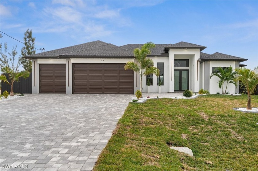 Welcome to 1134 SW 31st Ter, a brand-new construction home that - Beach Home for sale in Cape Coral, Florida on Beachhouse.com