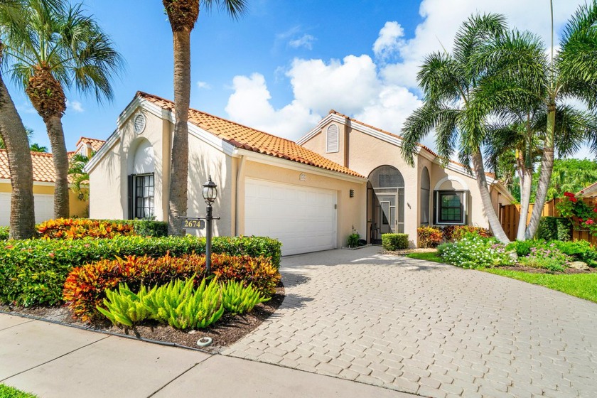 Located in the highly desirable Crystal Pointe Community in Palm - Beach Home for sale in West Palm Beach, Florida on Beachhouse.com