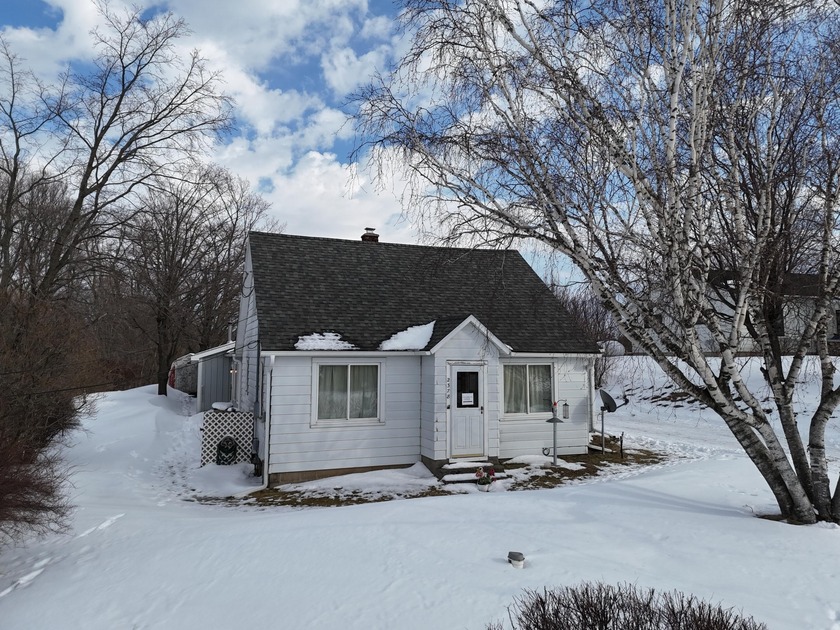 Discover charming Northern Michigan living in this 2-bedroom - Beach Home for sale in Traverse City, Michigan on Beachhouse.com