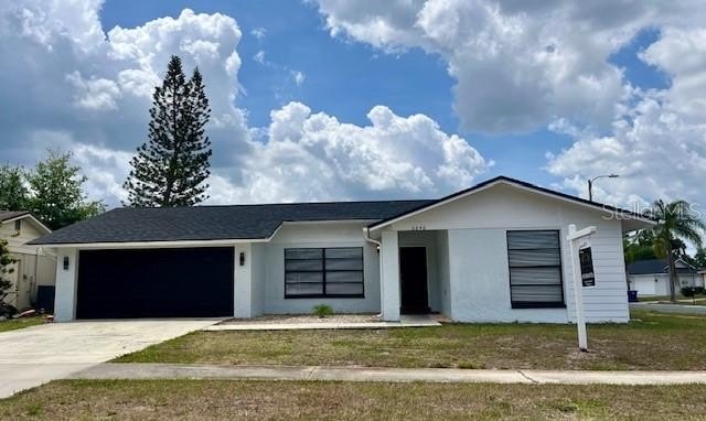 Beautiful Renovated Corner Lot Home! This home offers Modern - Beach Home for sale in New Port Richey, Florida on Beachhouse.com