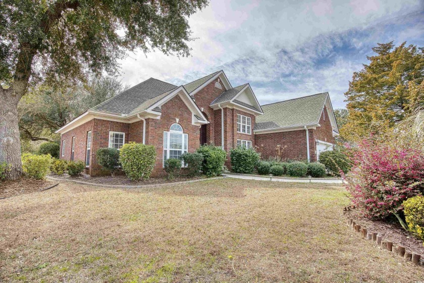 Price Reduced!!This beautiful single level brick front home is - Beach Home for sale in North Myrtle Beach, South Carolina on Beachhouse.com