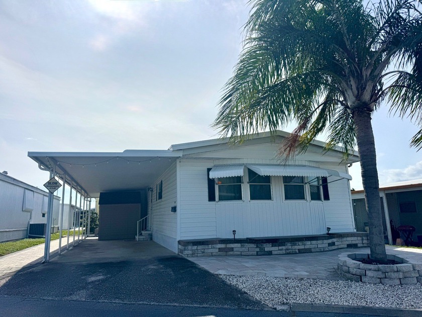 This 1981 manufactured home offers practical comfort and easy - Beach Home for sale in Bradenton, Florida on Beachhouse.com