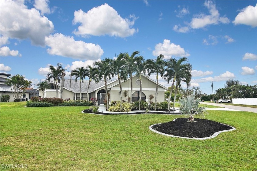 This stunning 3-bedroom w/den, 2-bath, 2 car oversized garage - Beach Home for sale in Cape Coral, Florida on Beachhouse.com