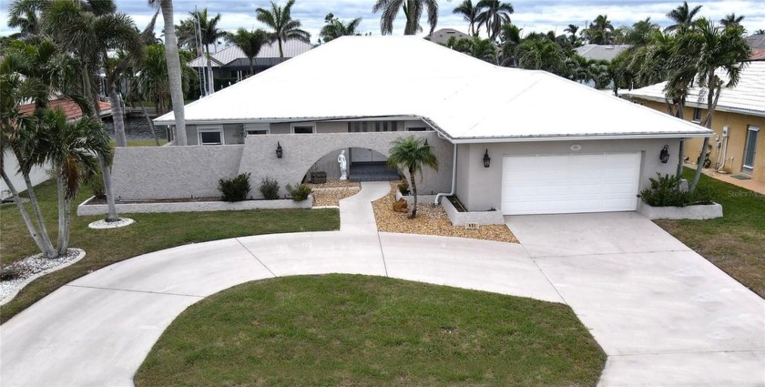 PUNTA GORDA ISLES: This custom 4-bedroom, 3-bathroom waterfront - Beach Home for sale in Punta Gorda, Florida on Beachhouse.com