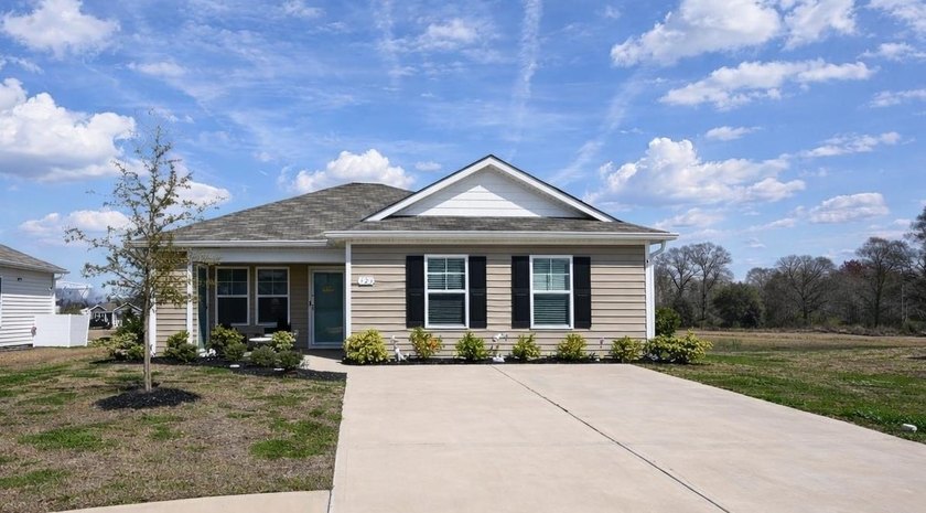 How cute is this home?! This beautifully maintained three - Beach Home for sale in Longs, South Carolina on Beachhouse.com