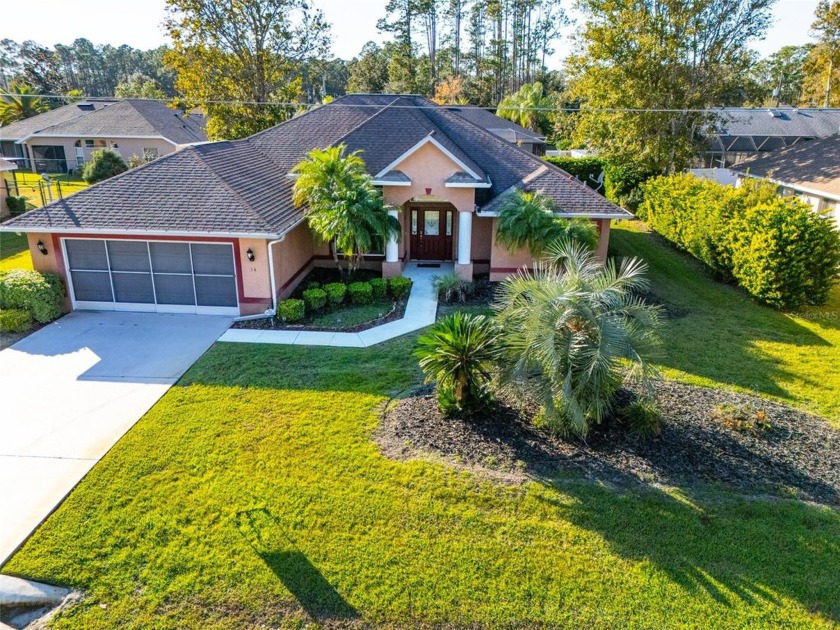 This is a fantastic home in the Cypress Knoll Golf Course - Beach Home for sale in Palm Coast, Florida on Beachhouse.com