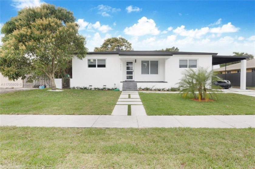 Welcome to this charming 5-bedroom, 3-bathroom home located at - Beach Home for sale in North Miami Beach, Florida on Beachhouse.com