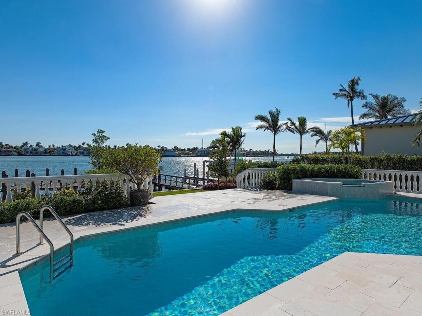 Rarely available Bayfront home in Aqualane Shores! Sweeping - Beach Home for sale in Naples, Florida on Beachhouse.com