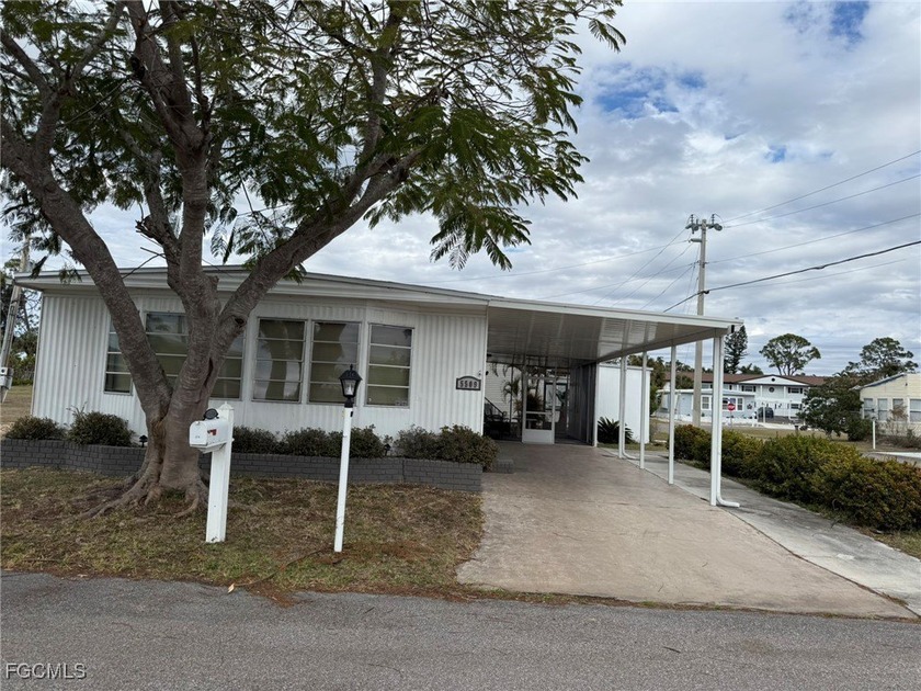Welcome to 5509 Harbor Lane in North Fort Myers, located in a - Beach Home for sale in North Fort Myers, Florida on Beachhouse.com
