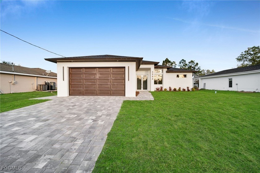 Brand-new construction offering 1,507 sq ft under air with a - Beach Home for sale in Lehigh Acres, Florida on Beachhouse.com