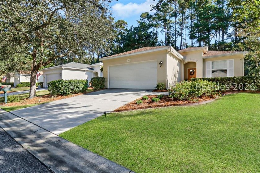 Tucked away on a quiet street in Sun City Hilton Head, this - Beach Home for sale in Bluffton, South Carolina on Beachhouse.com