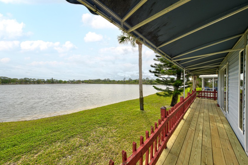 Direct Waterfront!! Two Car Garage AND a 2 car carport, hot tub - Beach Home for sale in Cocoa, Florida on Beachhouse.com