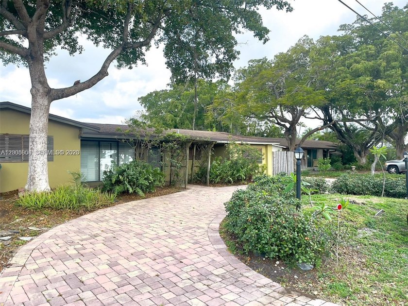 Large and updated canal front pool home with dock on oversized - Beach Home for sale in Oakland Park, Florida on Beachhouse.com