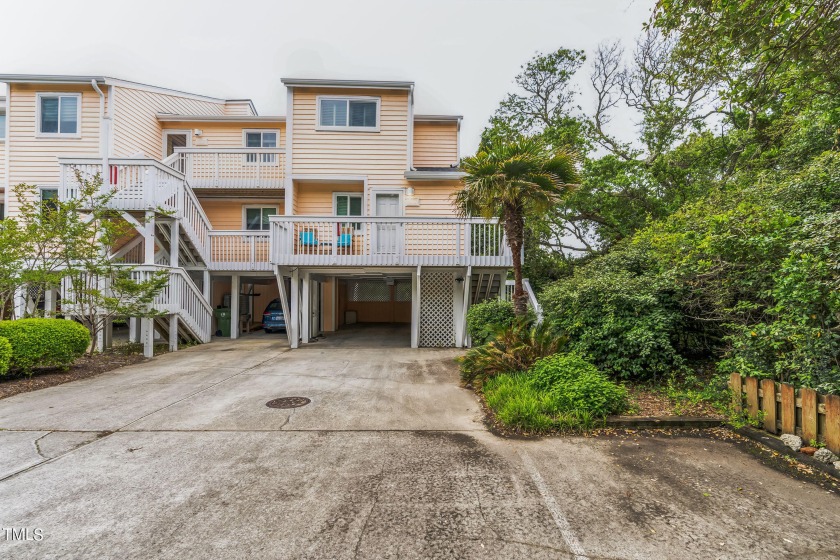 This is it! Located in a tranquil wooded grove with the beach - Beach Condo for sale in Kure Beach, North Carolina on Beachhouse.com