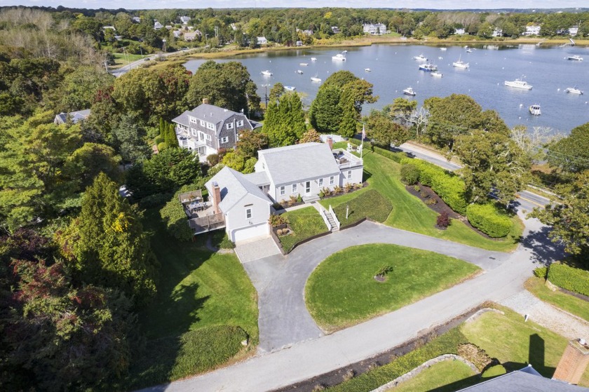 Perched on a bluff in one of Chatham's most coveted locations - Beach Home for sale in North Chatham, Massachusetts on Beachhouse.com