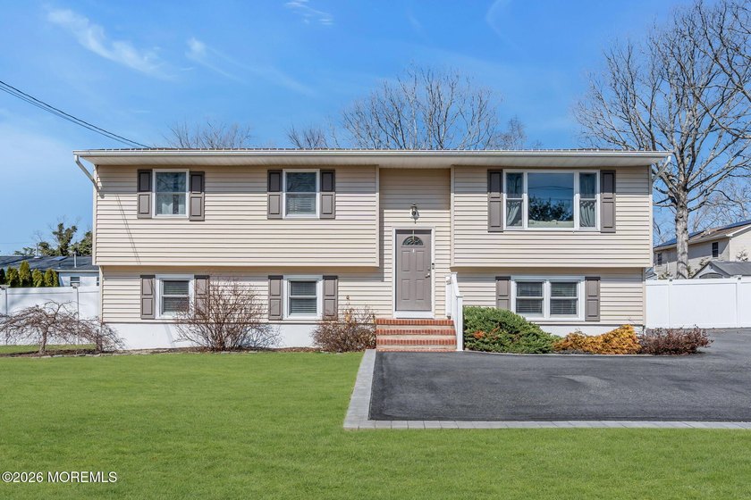 Welcome to this beautifully maintained 4-bedroom bi-level home - Beach Home for sale in Toms River, New Jersey on Beachhouse.com