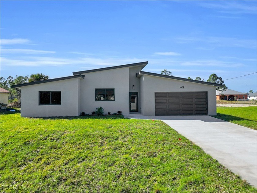 This unique modern house offers luxury at its best. Bright light - Beach Home for sale in Lehigh Acres, Florida on Beachhouse.com