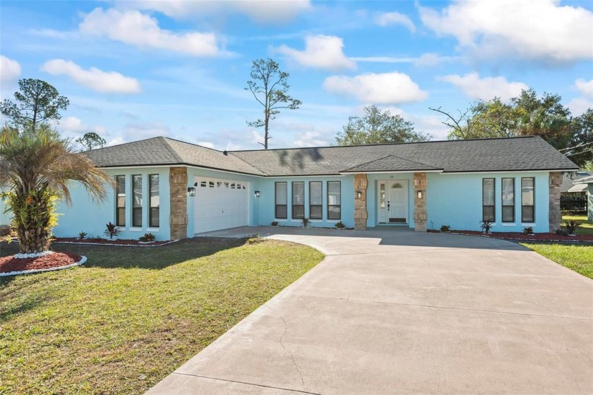 FIND REST AND RELAXATION IN THIS MOVE IN READY HOME ON RAELAND! - Beach Home for sale in Palm Coast, Florida on Beachhouse.com