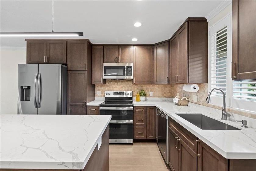 Step into a truly stunning oasis where modern updates blend - Beach Condo for sale in Kihei, Hawaii on Beachhouse.com