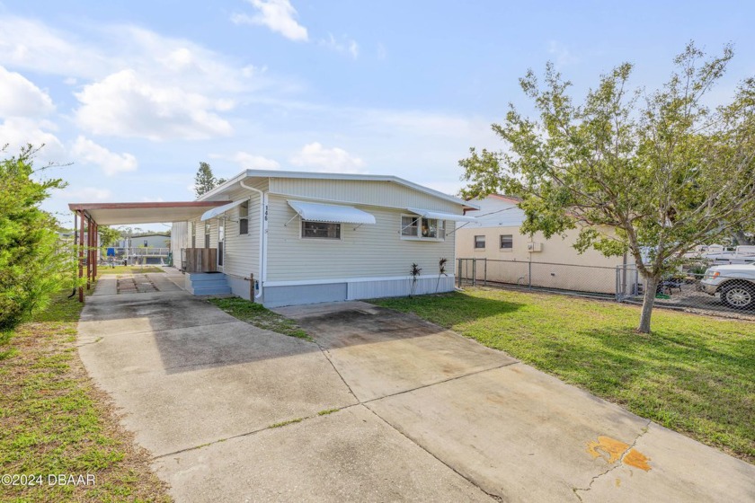 Nestled on a deep-water canal with direct access to the - Beach Home for sale in Edgewater, Florida on Beachhouse.com