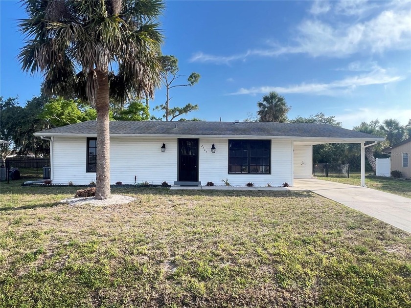 WELCOME HOME! This stunning 2-bedroom, 2-bathroom updated block - Beach Home for sale in Port Charlotte, Florida on Beachhouse.com
