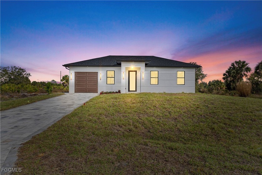 Welcome home to a brand new construction that blends modern - Beach Home for sale in Lehigh Acres, Florida on Beachhouse.com