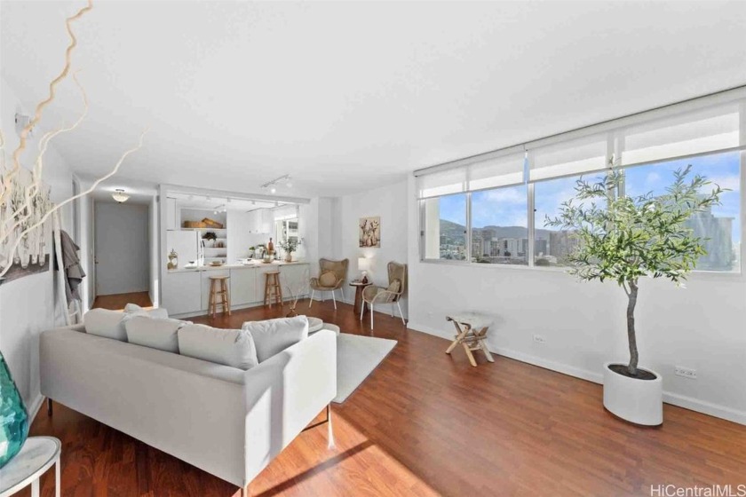 This stunning end unit welcomes you with a bright and inviting - Beach Condo for sale in Honolulu, Hawaii on Beachhouse.com