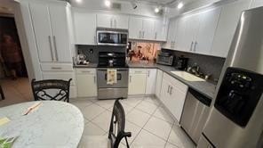 Spacious 2 Bed 2 Bath 1st Floor corner unit. Kitchen and baths - Beach Condo for sale in Tamarac, Florida on Beachhouse.com
