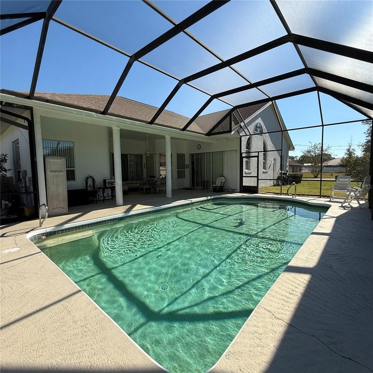 Spacious 3 Bedroom Pool Home with 3 Car Garage  Bonus Dining - Beach Home for sale in Palm Coast, Florida on Beachhouse.com