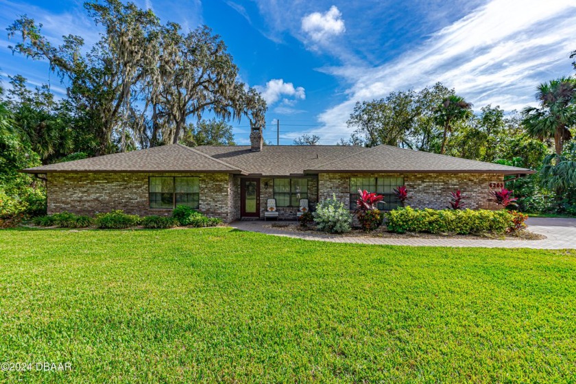 Private 1-Acre Brick Home in Beautiful Spruce Creek Estates - - Beach Home for sale in Port Orange, Florida on Beachhouse.com