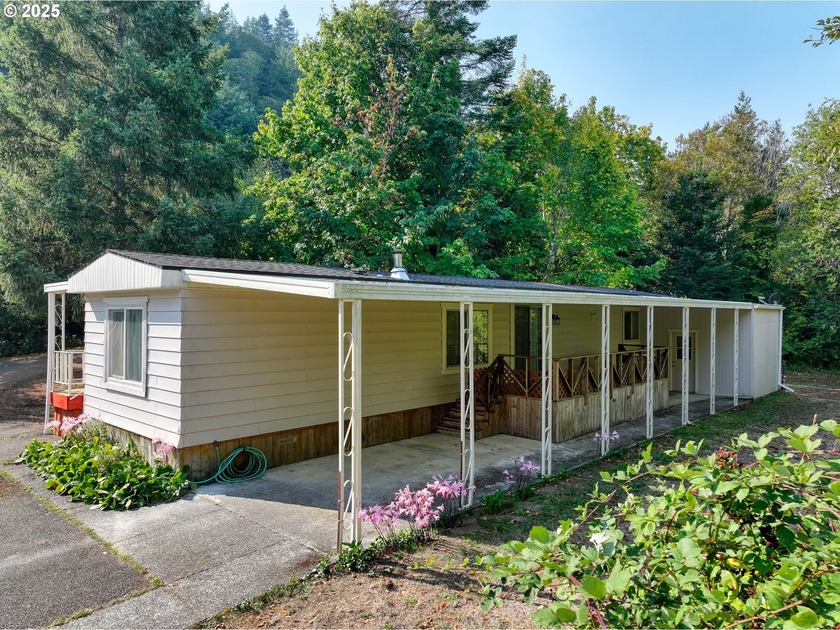 This cute single-wide manufactured home sits on almost an acre - Beach Home for sale in Gold Beach, Oregon on Beachhouse.com