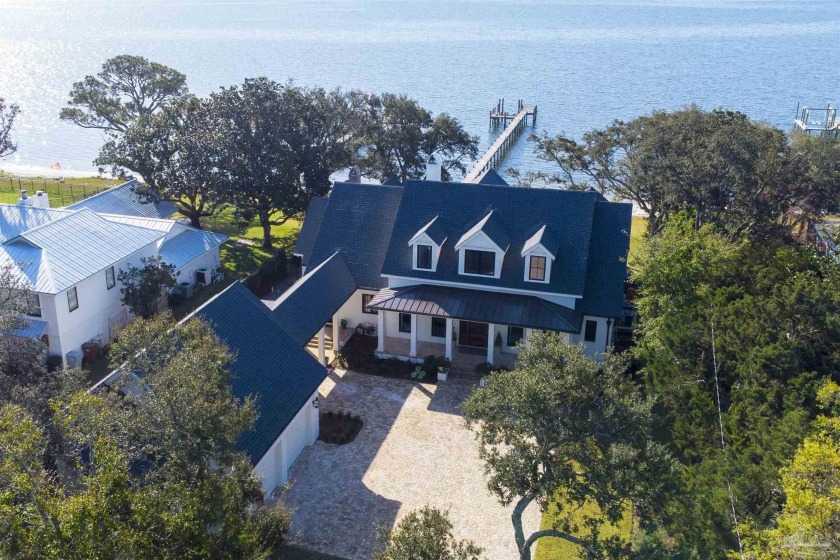 Enjoy relaxed Florida living in this picturesque waterfront - Beach Home for sale in Gulf Breeze, Florida on Beachhouse.com