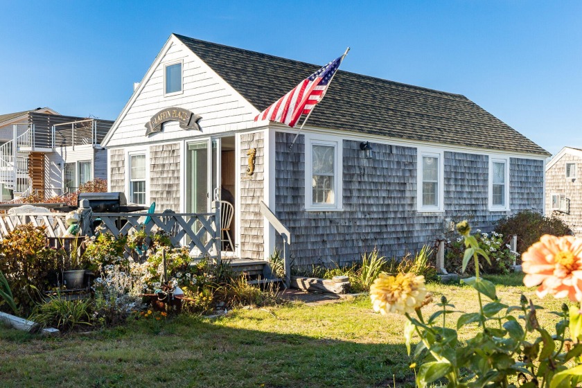 Live at the beach in this classic Cape Cod cottage. Located at - Beach Condo for sale in Provincetown, Massachusetts on Beachhouse.com