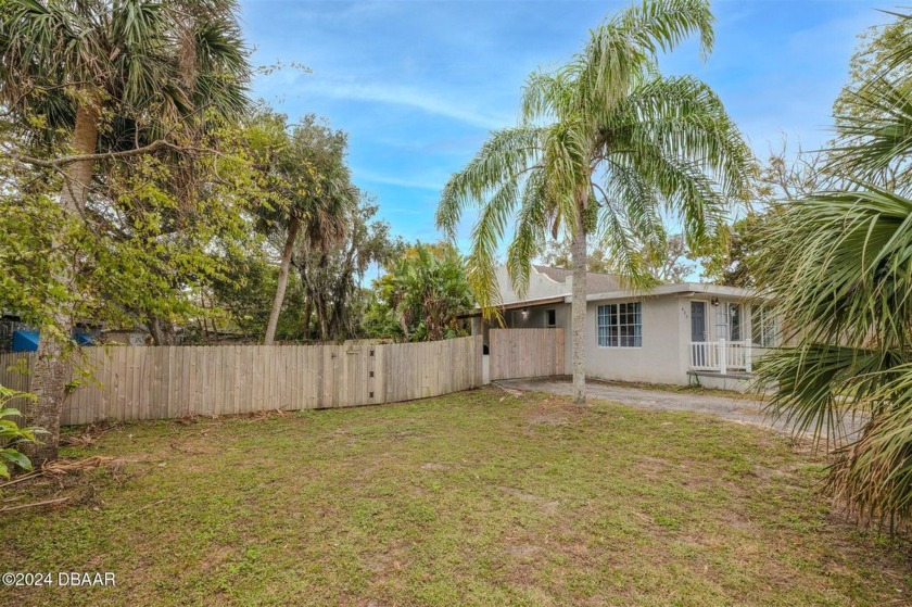 Escape to your own private oasis just steps from the river! This - Beach Home for sale in Daytona Beach, Florida on Beachhouse.com