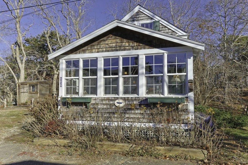 Tucked away in the desirable Nauhaught Bluffs neighborhood, this - Beach Home for sale in Wellfleet, Massachusetts on Beachhouse.com