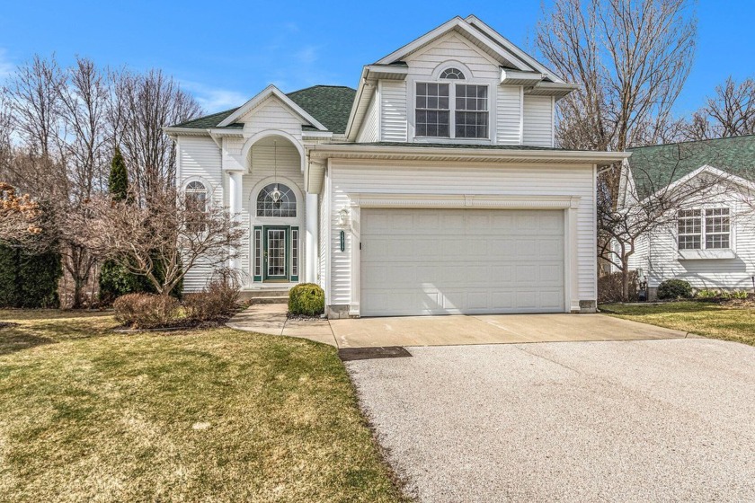 This elegant, stand-alone Saddlebrook Farms condo boasts soaring - Beach Condo for sale in Spring Lake, Michigan on Beachhouse.com