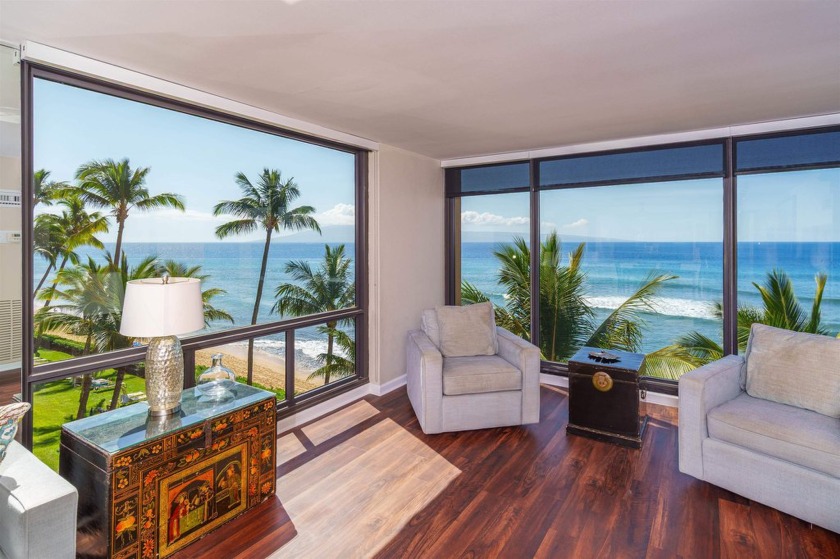Driving down Kaanapali Shores Place under the majestic shade of - Beach Condo for sale in Lahaina, Hawaii on Beachhouse.com