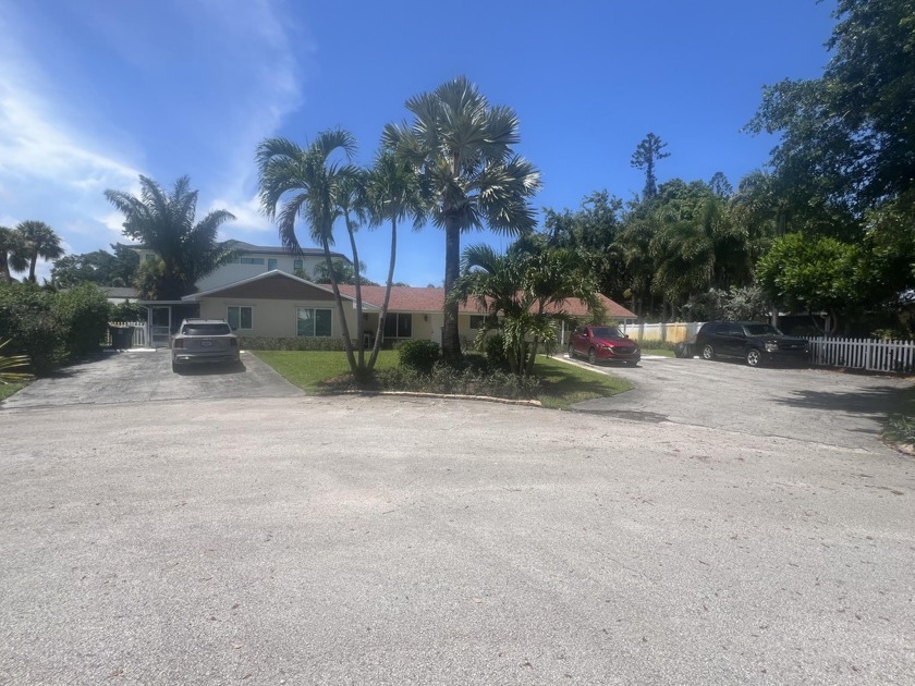 This non-HOA 3-unit triplex is located in unincorporated Palm - Beach Townhome/Townhouse for sale in North Palm Beach, Florida on Beachhouse.com