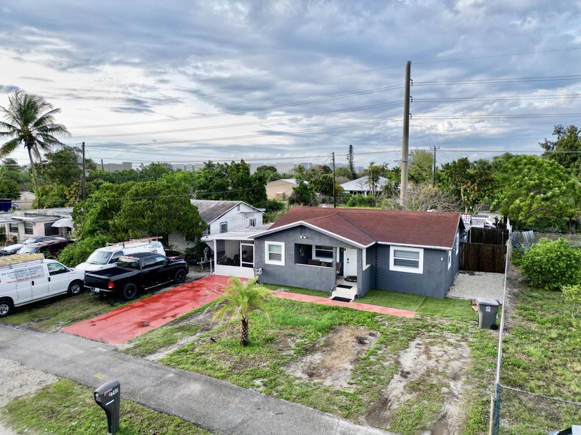 Welcome to this charming single-story gem in the highly - Beach Home for sale in West Palm Beach, Florida on Beachhouse.com