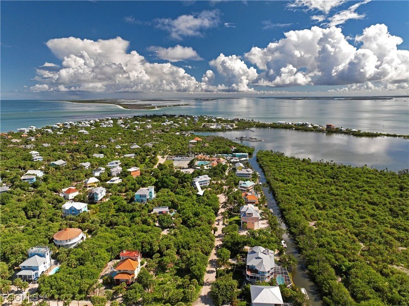 Oversized corner lot bordering Rum Rd. Just steps from club - Beach Lot for sale in North Captiva Island, Florida on Beachhouse.com