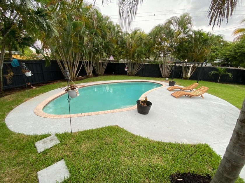 Welcome to this stunning home nestled in a serene, charming - Beach Home for sale in Boca Raton, Florida on Beachhouse.com