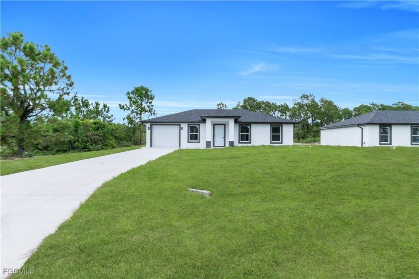 Brand-New Construction - Move-In Ready! This gorgeous 3-bedroom - Beach Home for sale in Lehigh Acres, Florida on Beachhouse.com