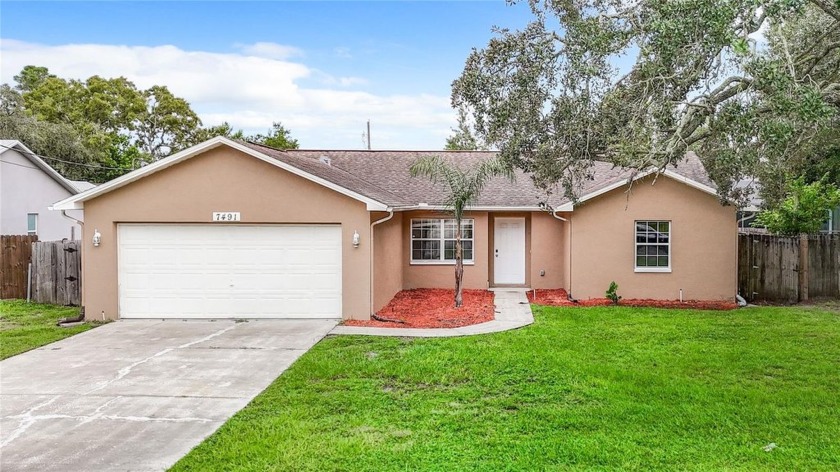 $15,000 PRICE REDUCTION!  Welcome to 7491 Apache Trail, a - Beach Home for sale in Spring Hill, Florida on Beachhouse.com