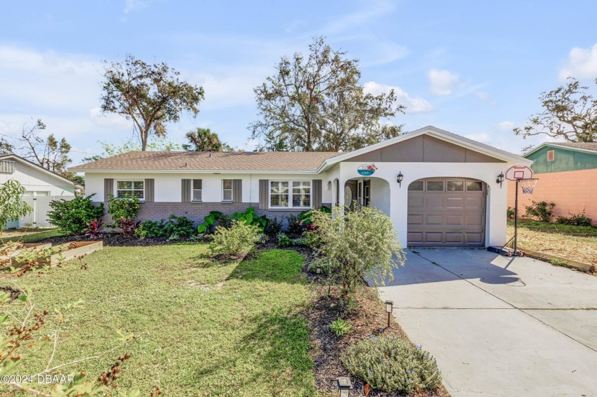 Welcome to this beautifully updated 3-bedroom, 2-bathroom home - Beach Home for sale in Edgewater, Florida on Beachhouse.com