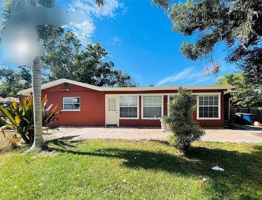 Welcome to this charming 3-bedroom, 2-bath home located in the - Beach Home for sale in Sarasota, Florida on Beachhouse.com