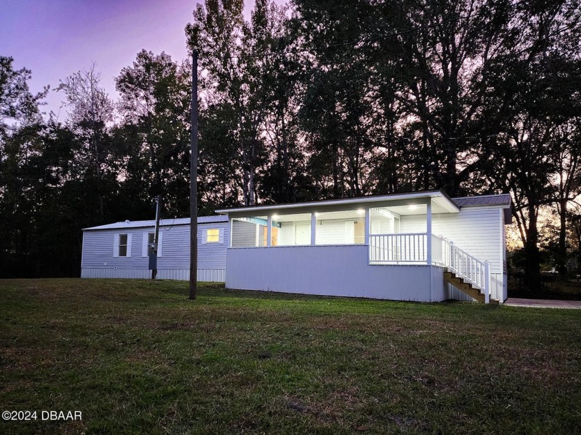 Welcome to this beautifully remodeled manufactured home, set on - Beach Home for sale in Bunnell, Florida on Beachhouse.com