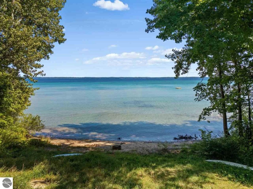 Beautiful homestead with 437 feet of sandy bottom private - Beach Home for sale in Traverse City, Michigan on Beachhouse.com