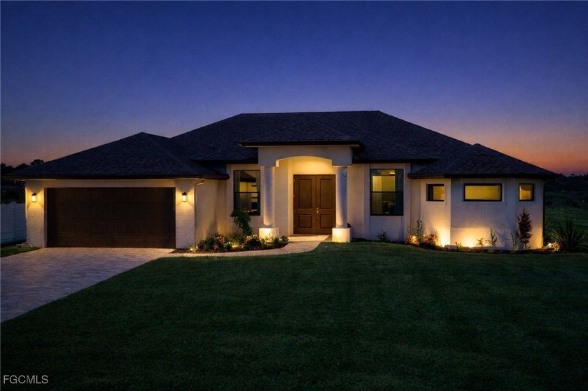 A 2022-built pool home on a true double lot with a wide-open - Beach Home for sale in Cape Coral, Florida on Beachhouse.com